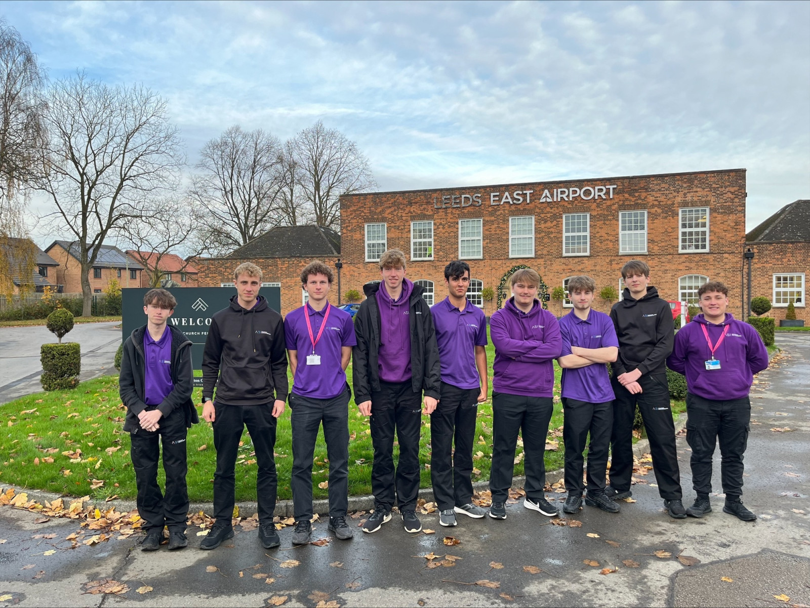 Students standing outside Leeds East Airport